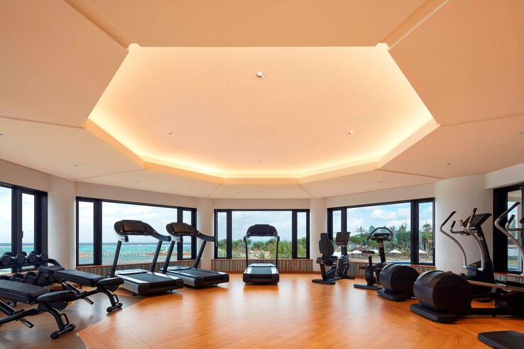 Sheraton okinawa fitness center with treadmills and sea views.