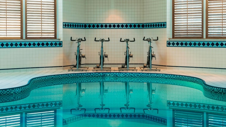Indoor pool with four exercise bikes