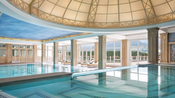 Indoor pool with columns and domed ceiling