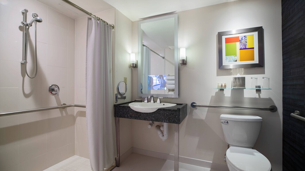 バリアフリーのバスルーム − 車椅子用シャワー