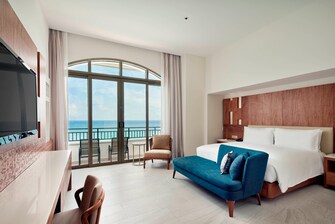 Suite frente al mar - Dormitorio con cama tamaño King