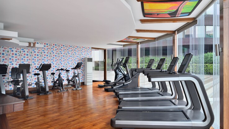 Fitness center with treadmills and bikes.