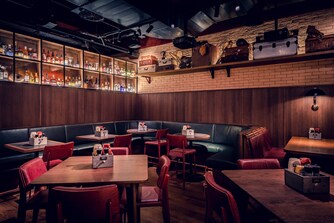 Bar und Restaurant Champions – Sitzbereich