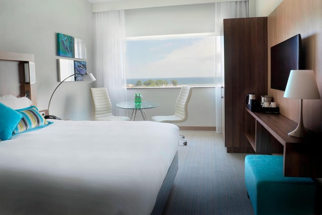 Guest Room with bed,sea view and TV