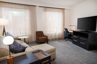 Suite de un dormitorio con dos camas tamaño Queen - Sala de estar