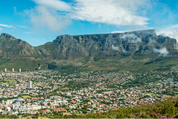 Aerial view of Cape Town with large mountain in background