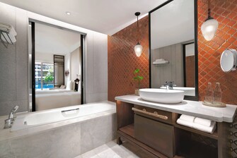 Deluxe Zimmer mit Zugang zum Lagunen-Pool – Badezimmer