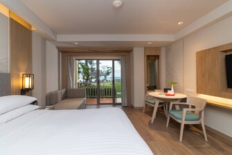Premier Gästezimmer mit Kingsize-Bett und Zugang zum Strand