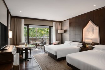 Premium Zimmer mit 2 Doppelbetten – Poolblick