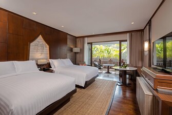 Premium Zimmer mit 2 Queensize-Betten – Poolblick