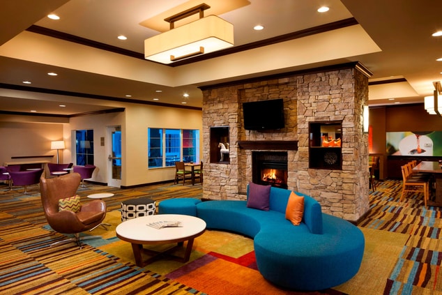 Lobby with fireplace in Houston Airport hotel