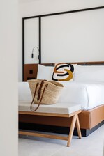 Suite con vista al mar – Dormitorio con cama tamaño King