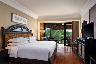 Suite Executive - Dormitorio con cama King