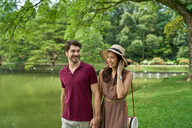 Couple Walking In The Park