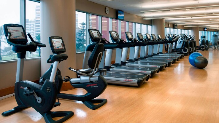 Fitness Center with row treadmills along wall.