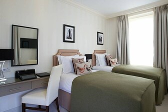 Habitación clásica con dos camas individuales