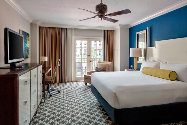 Our Emerald Bay Rooms feature furnished balconies overlooking our main atrium’s lush indoor gardens. Settle into accommodations with stylish décor reminiscent of our Central Florida surroundings.