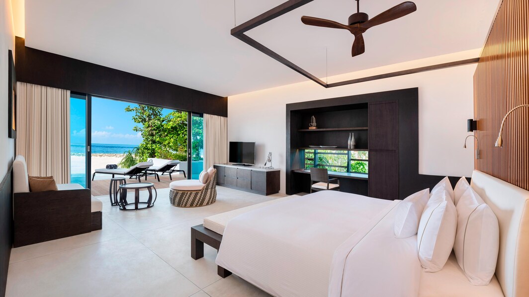Heavenly Beach Residence com piscina - Quarto com uma cama king-size