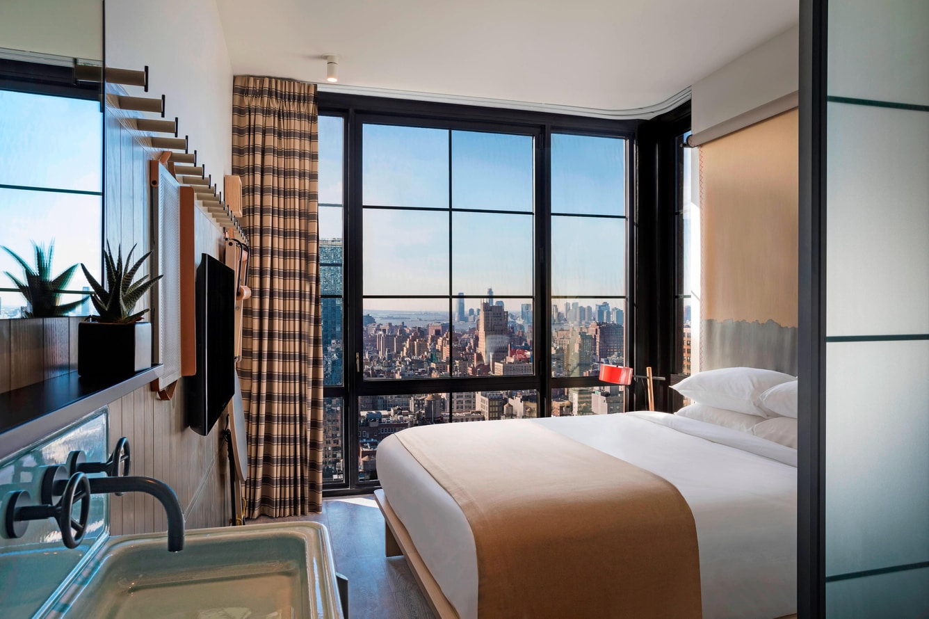 King guest room with high floor city and harbor view.