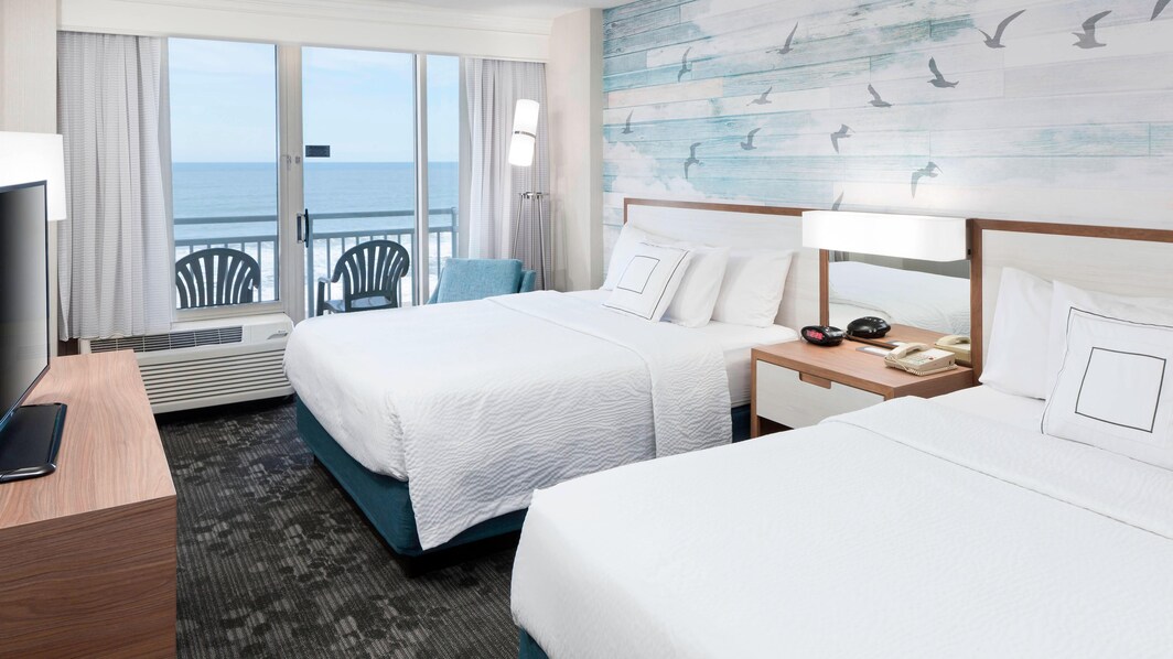 Suite central frente al mar con dos camas Queen - Dormitorio
