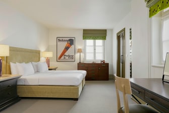 Schlafzimmer eines Deluxe Zimmers – 2 Twinsize-Betten