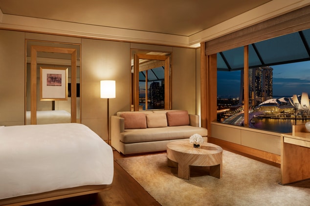Guest room with King bed and views of Marina Bay.