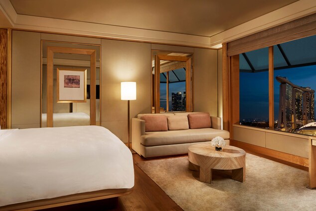 Guest room with King bed, club access and views of Marina Bay.