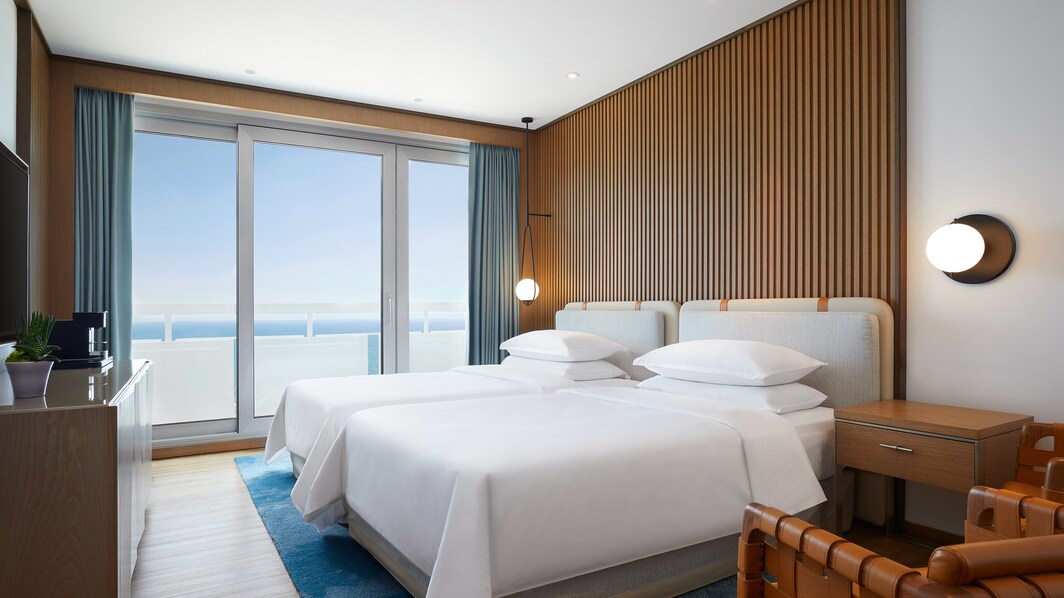 Habitación Deluxe con dos camas individuales frente al mar