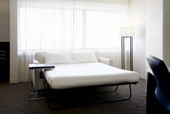 Chambre avec canapé-lit