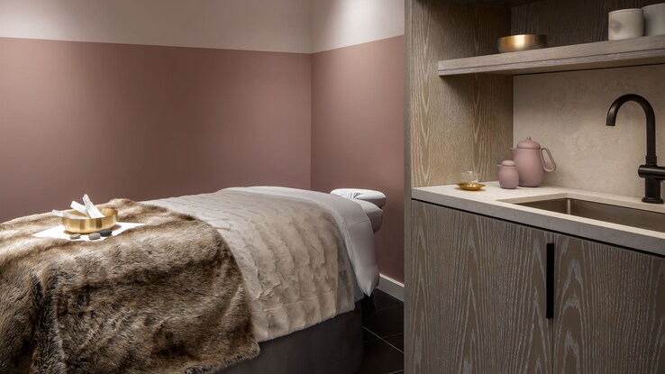 Iridium Spa treatment room with massage bed.