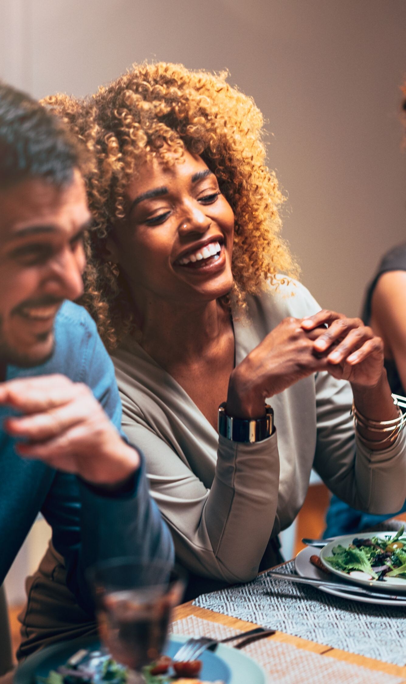Multi-Ethnic Friends Having Fun Together During A Dinner Celebration