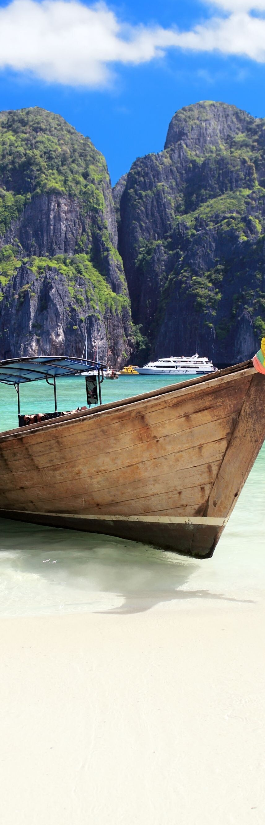 Ko Phi Phi National Marine Preserve, Beautiful, Vibrant Color, Travel, Longtail Boat, People Traveling, Tourism, Passenger Ship, Non-Urban Scene, Leisure Activity, Holiday, Cloudscape, Beauty In Nature, Fame, Phi Phi Islands, Ornate, Seascape, Maya Bay, Coastline, Ship's Bow, Thai Culture, Moored, Mayan, Beauty, Scenics, Phuket Province, Thailand, Journey, Idyllic, Relaxation, Tranquil Scene, Exoticism, Multi Colored, Blue, Turquoise Colored, Cultures, Famous Place, Tropical Climate, Travel Destinations, Vacations, Transportation, Nature, Outdoors, Recreational Pursuit, Tourist, Asia, Sunlight, Summer, Sand, Reef, Cliff, Island, Beach, Bay Of Water, Landscape, Cloud - Sky, Sky, Lagoon, Sea, Water's Edge, Water, Tourist Resort, Barge, Nautical Vessel, Mode of Transport, Stranded