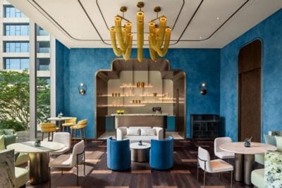 contemporary blue lounge space, tables