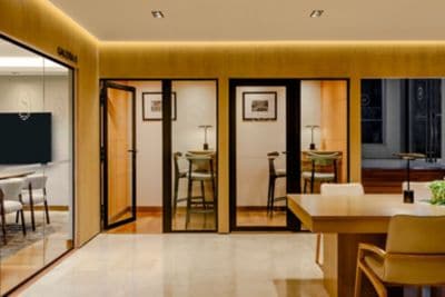Small private work booths with tables and chairs