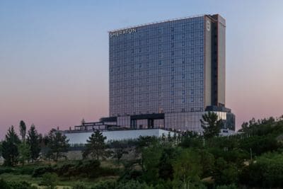 hotel exterior at dusk