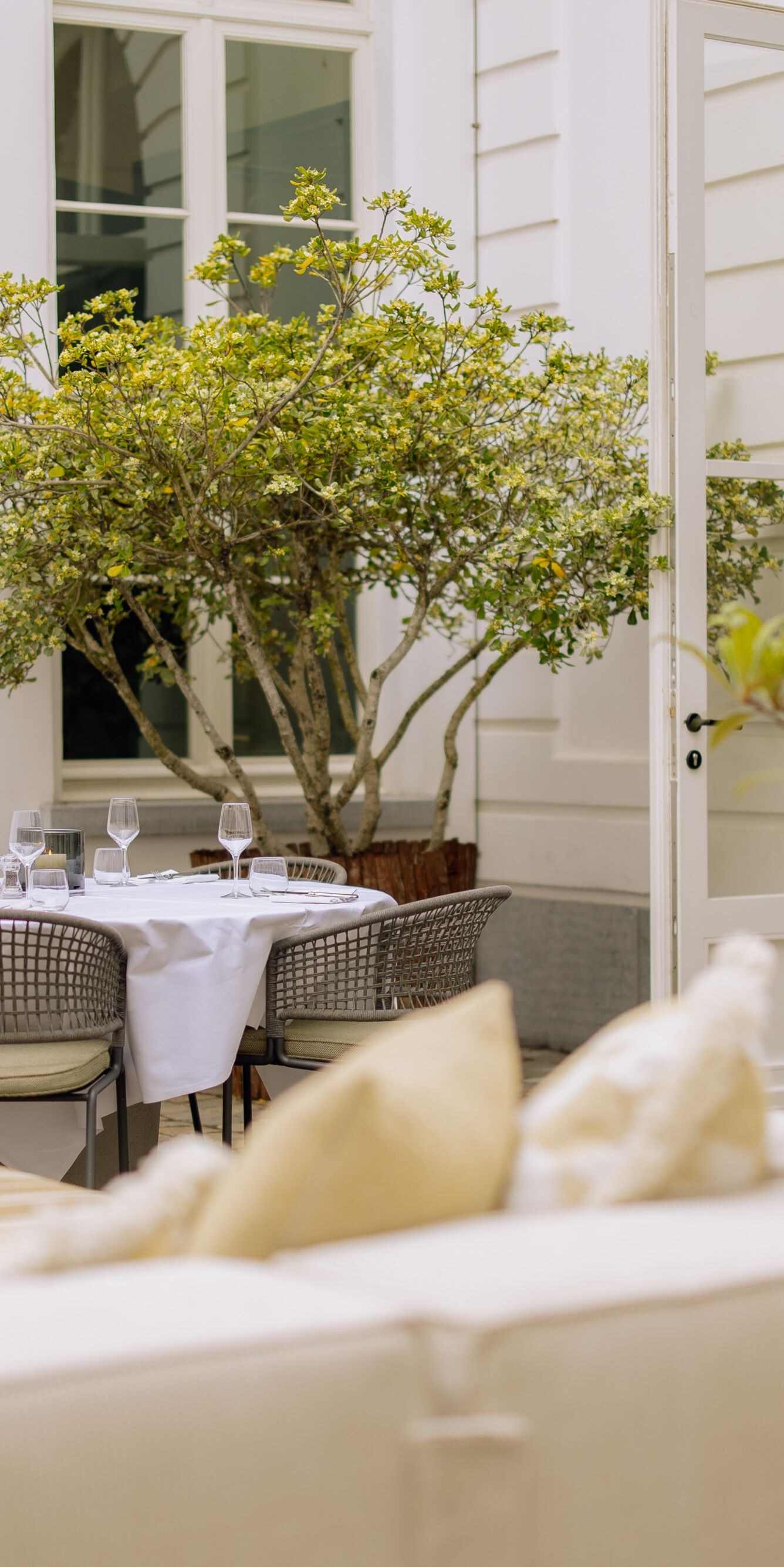 Outdoor patio with a set dining table