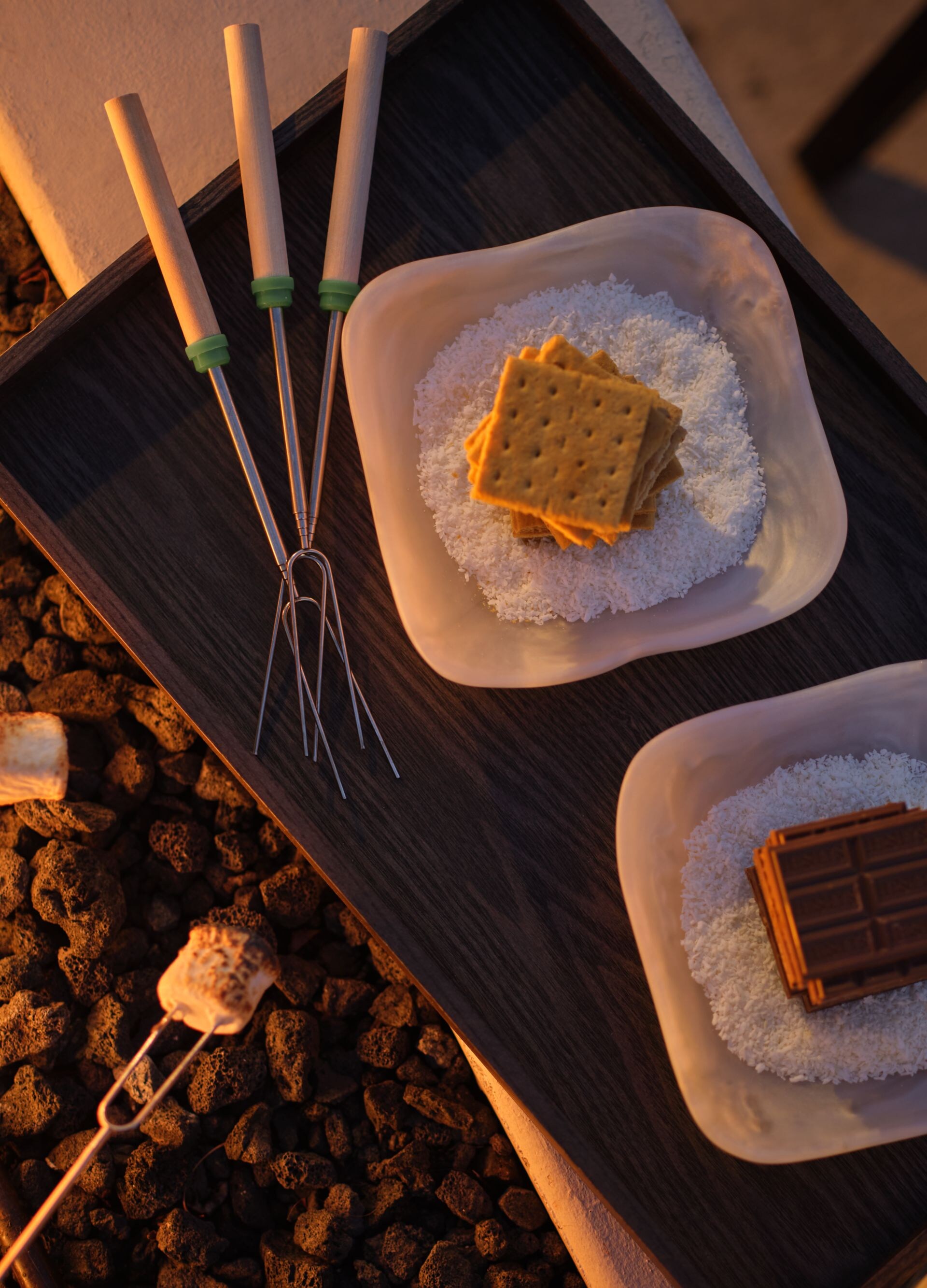 S'more Station with roasters next to fire