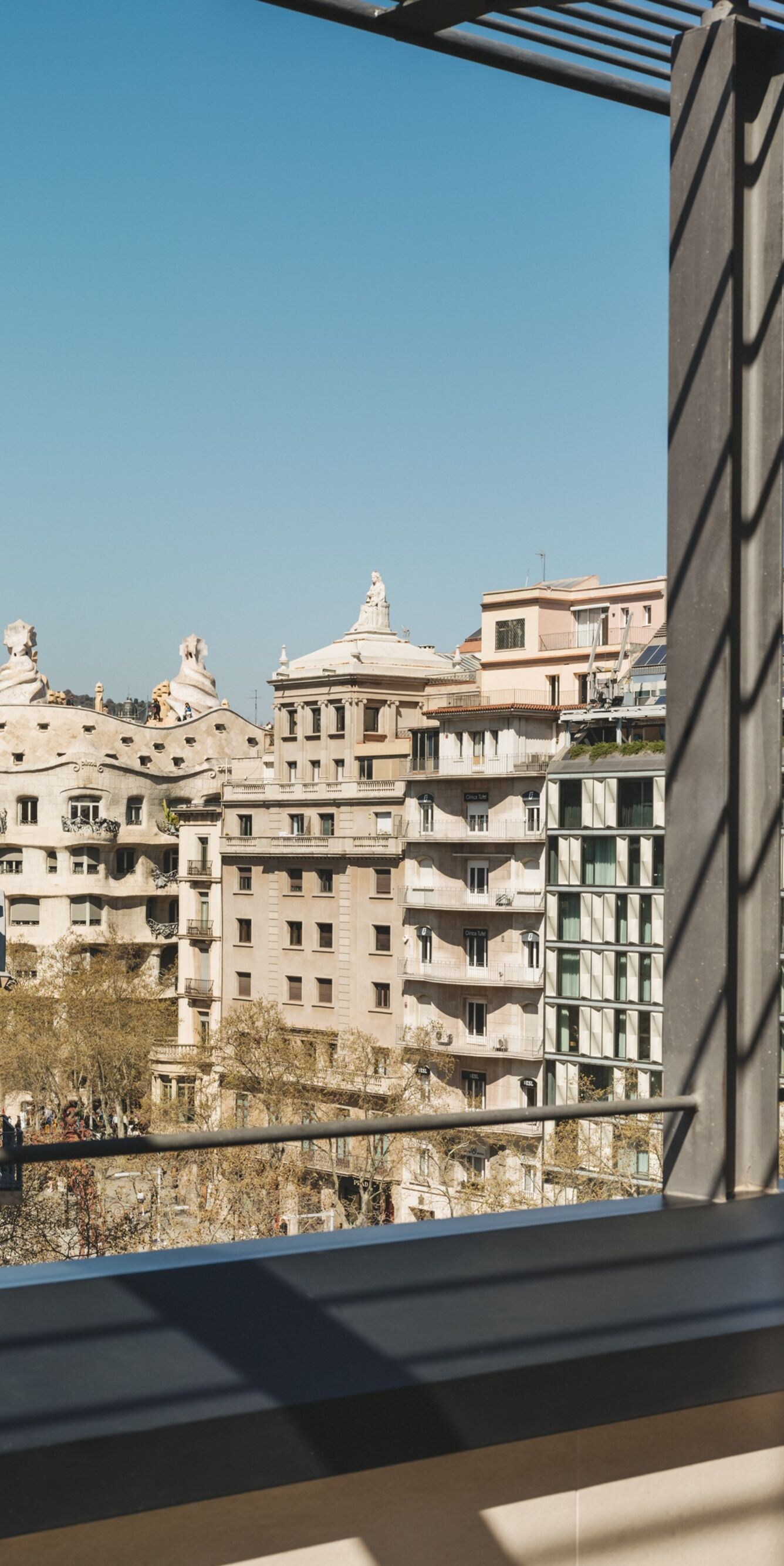 Window view of La Pedrera rooftops