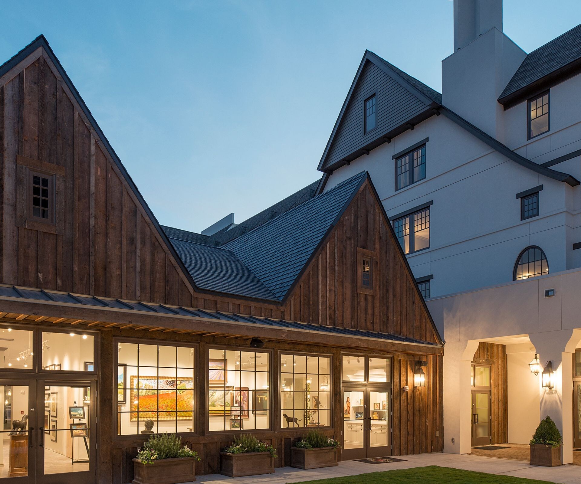 Courtyard with lawn and rustic architecture
