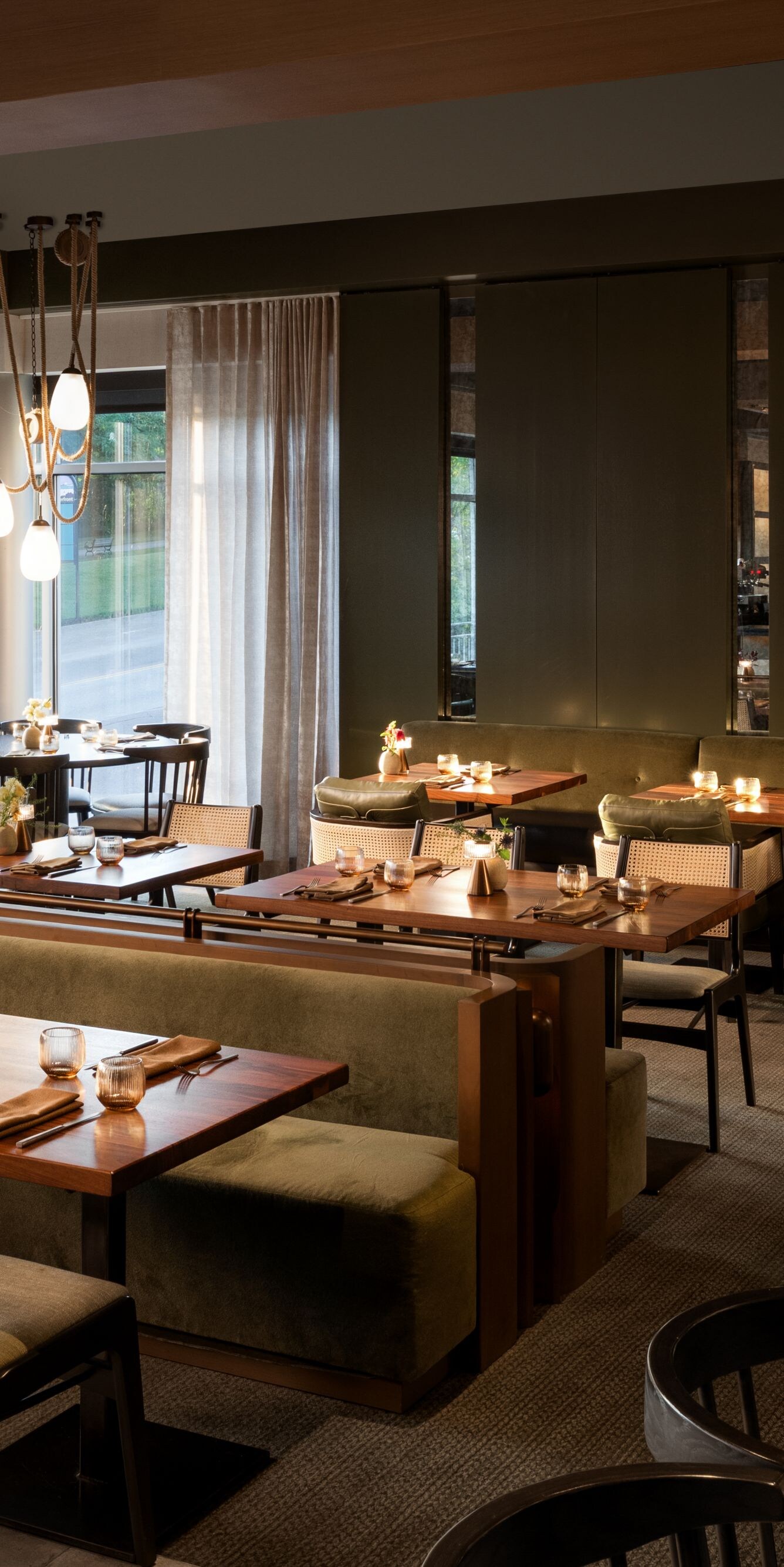 Warmly lit dining room with natural colors