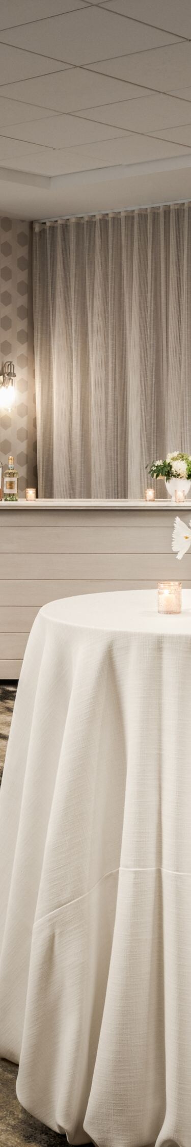 cocktail tables with white linens