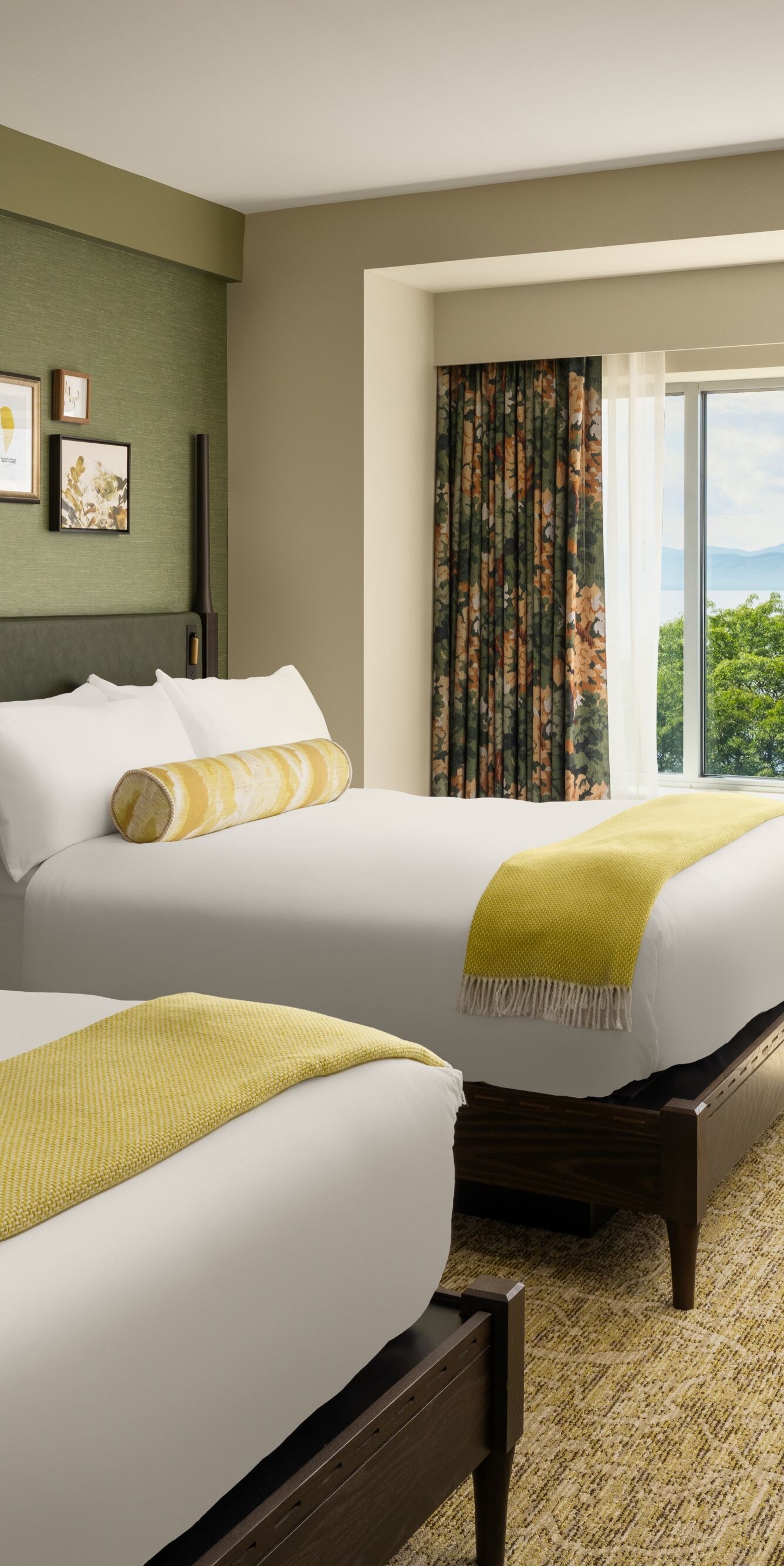 Guest room with two queen beds and lake view