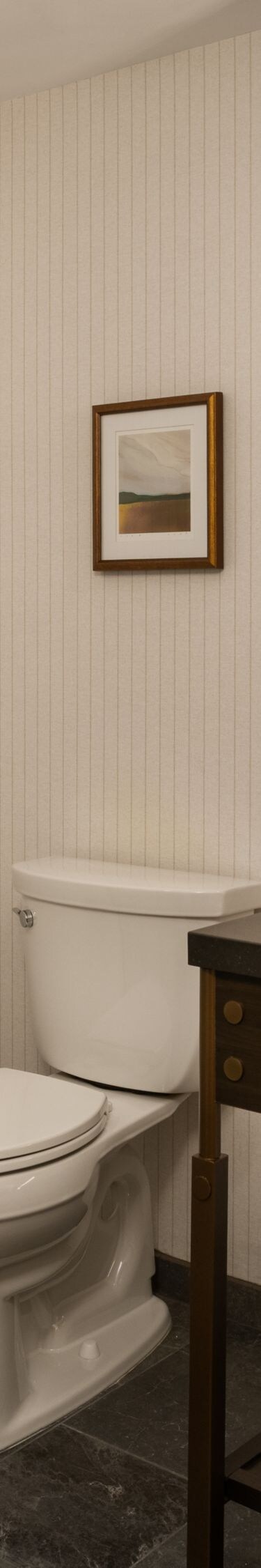 Corner shower, vanity with mirror and toilet