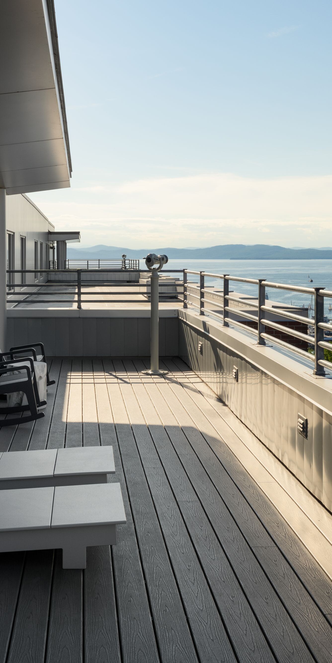 Top Floor balcony, lounge chairs, view of lake 