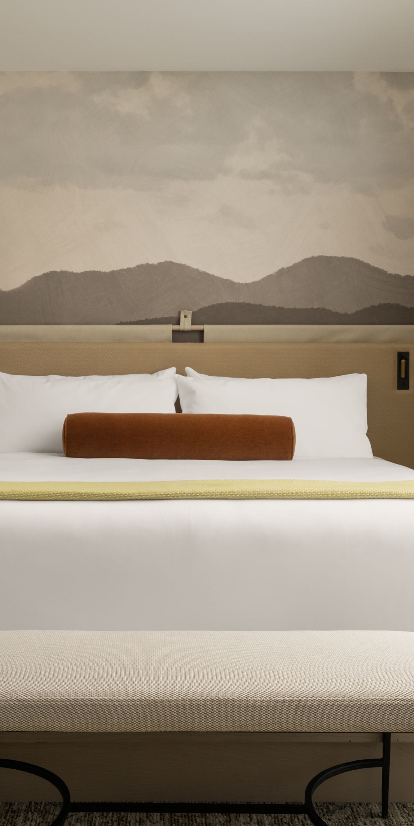 King bedroom with balcony view and mural wall