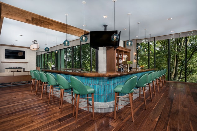 Rookery Bar with bar stool seating and lake view 