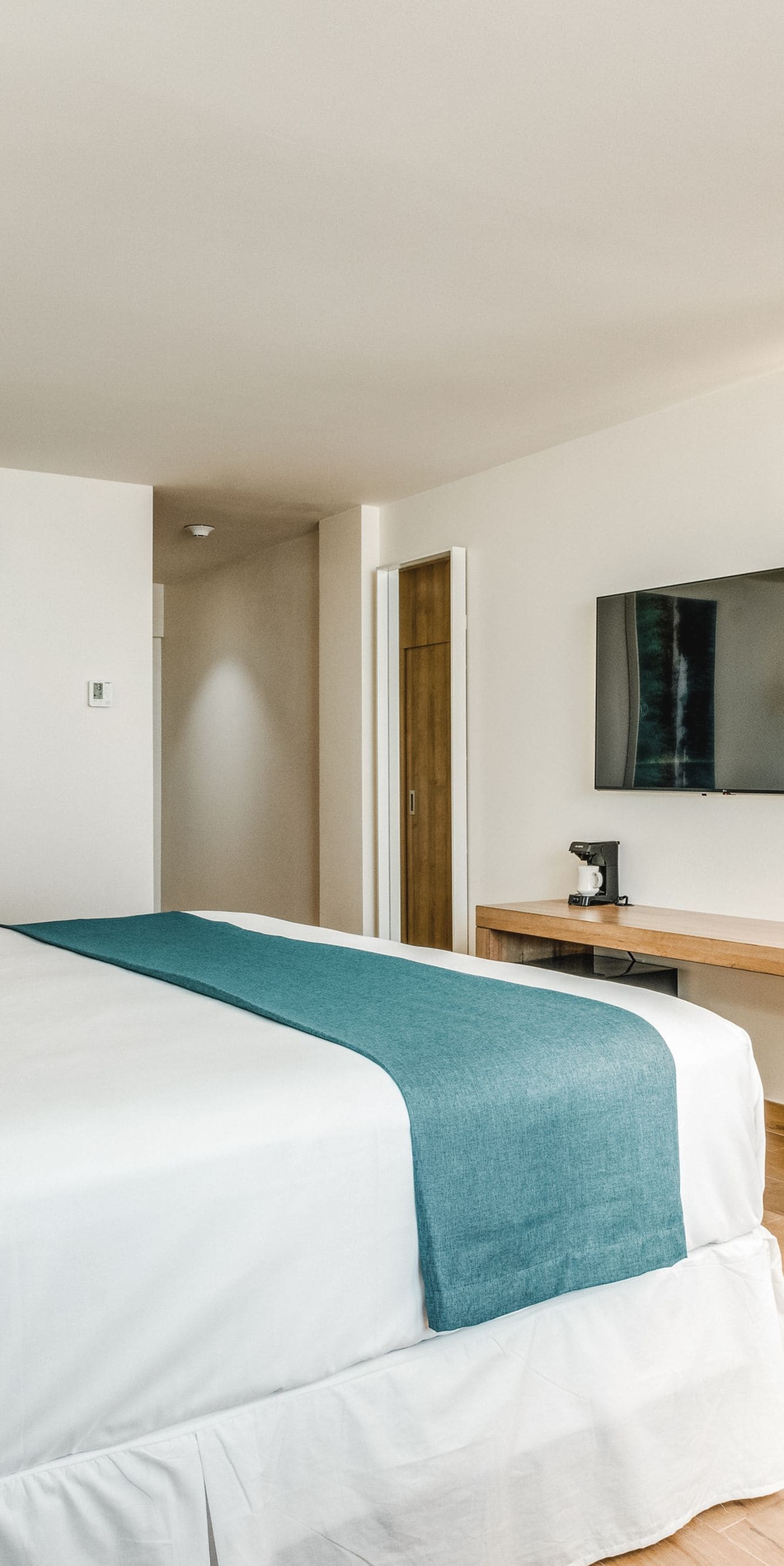 Bedroom with desk and TV