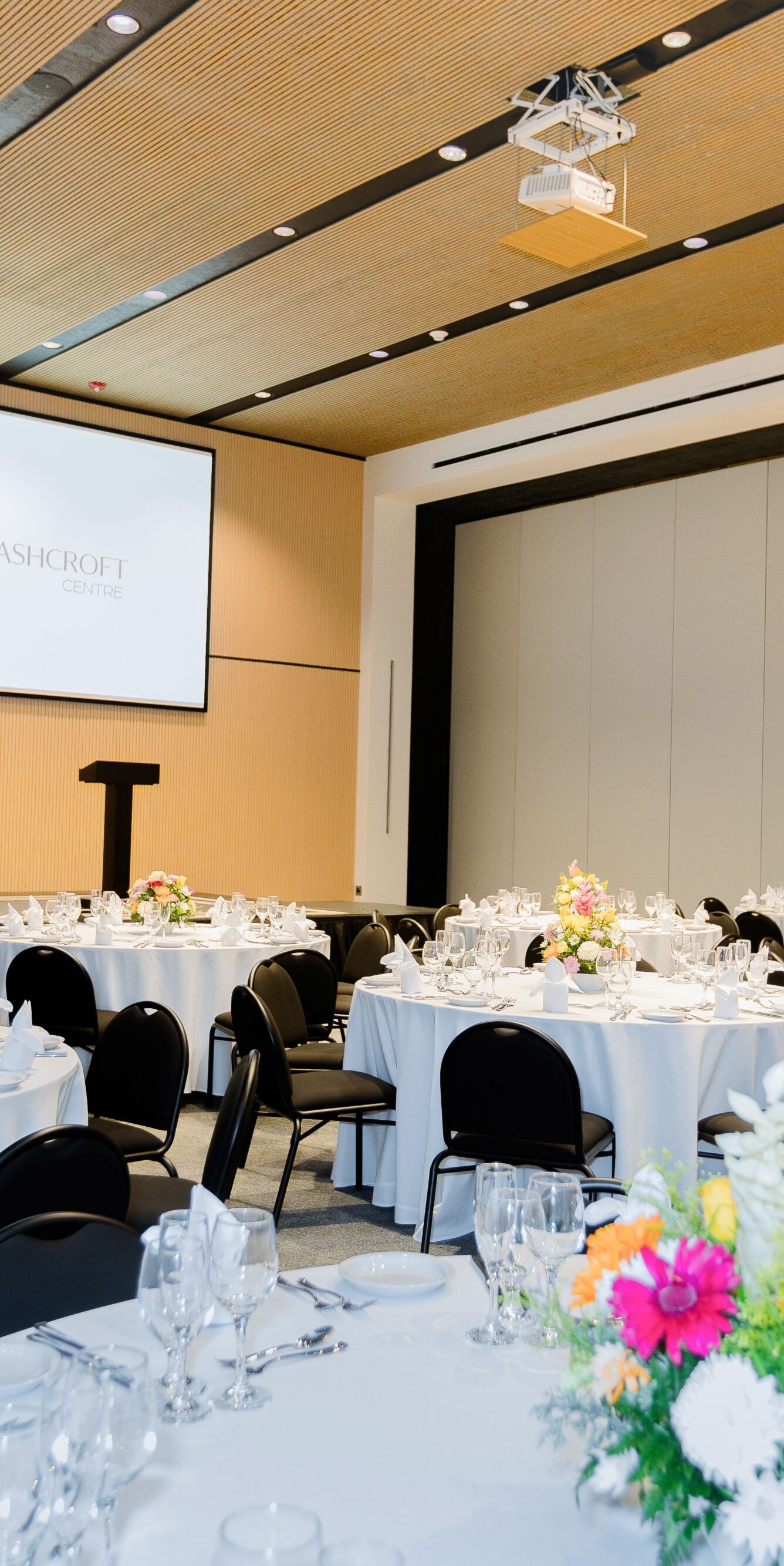 Banquet tables with floral centerpieces