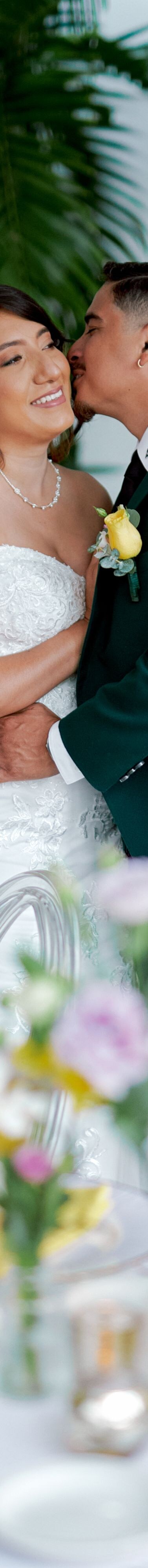 Couple embracing at decorated table
