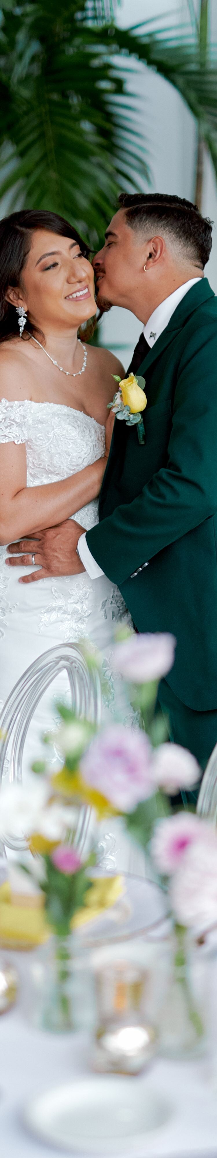 Couple embracing at decorated table